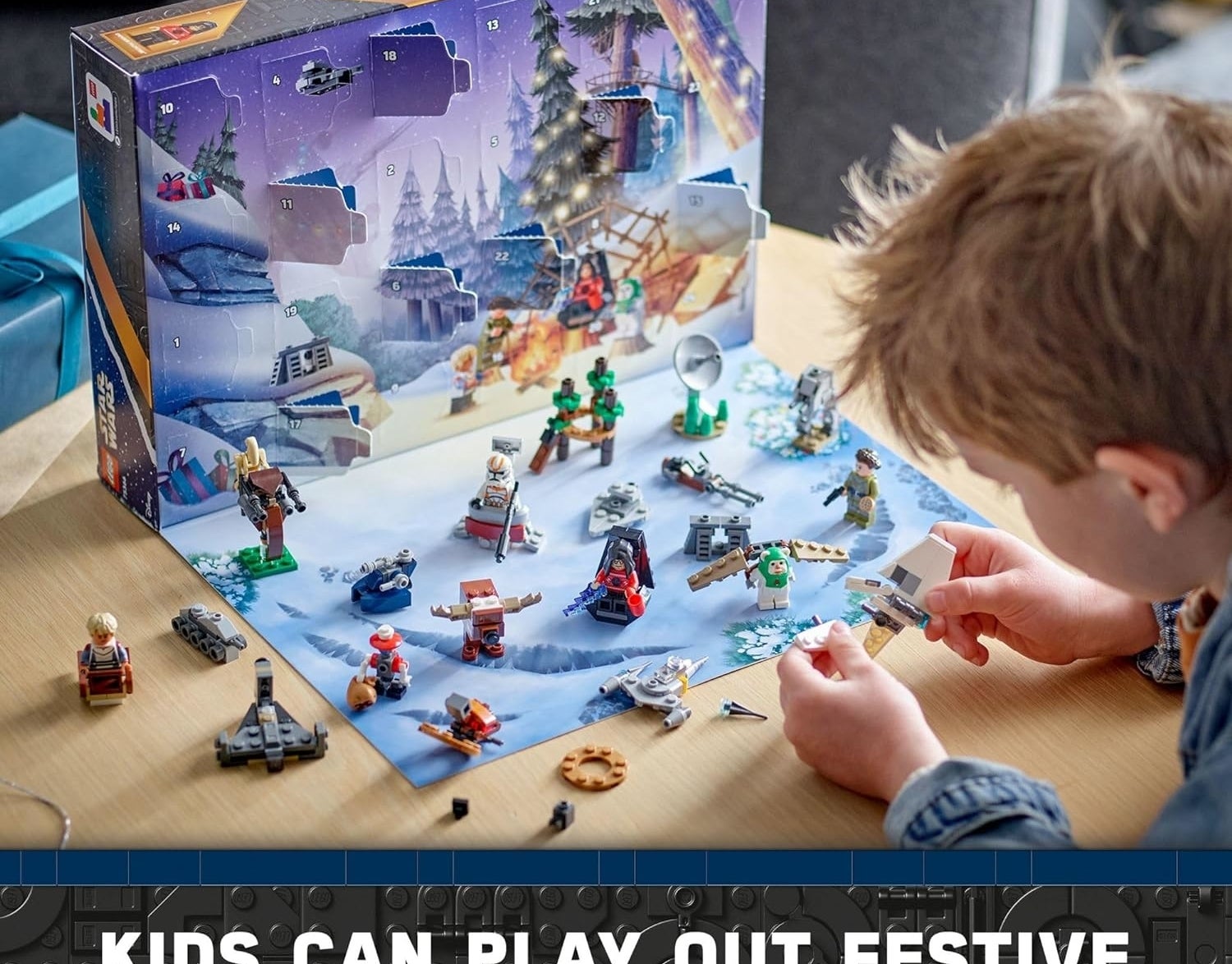a child playing with star wars legos from an advent calendar