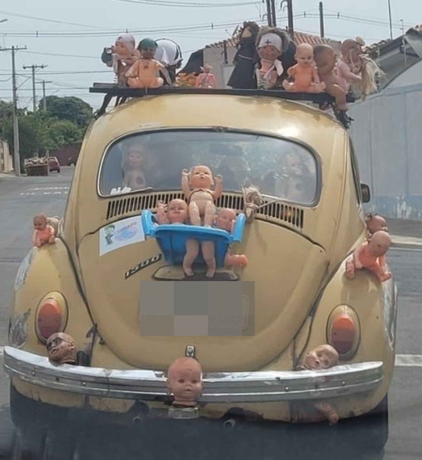 Dolls all over a car