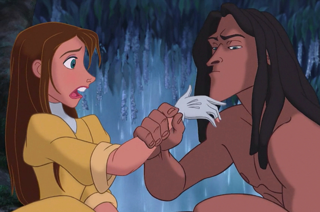 Tarzan grabbing Jane's gloved hand and examining it