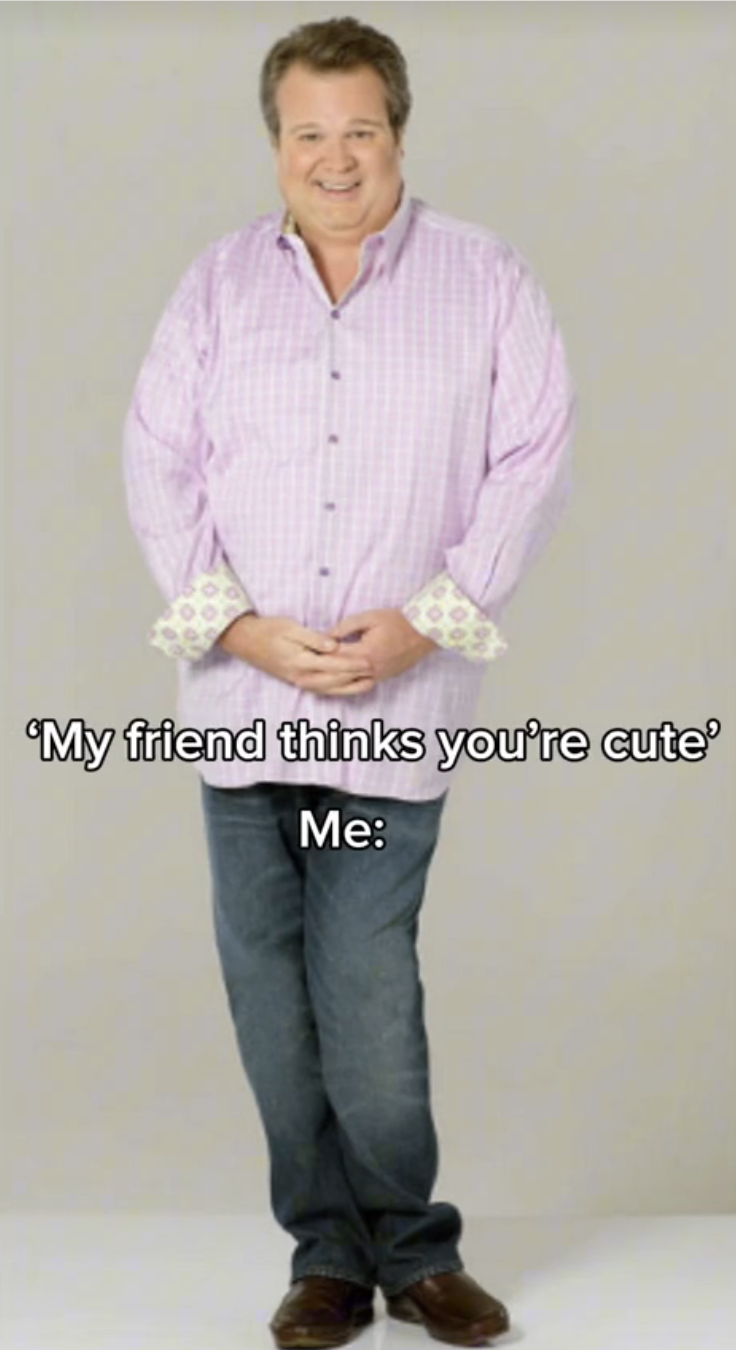 Eric Stonestreet posing as his character Cameron Tucker for Modern Family images; meme&#x27;d to say &quot;my friend thinks your cute&quot;