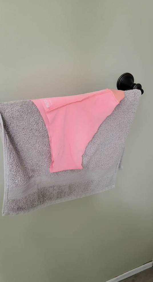 Pink panties on a towel