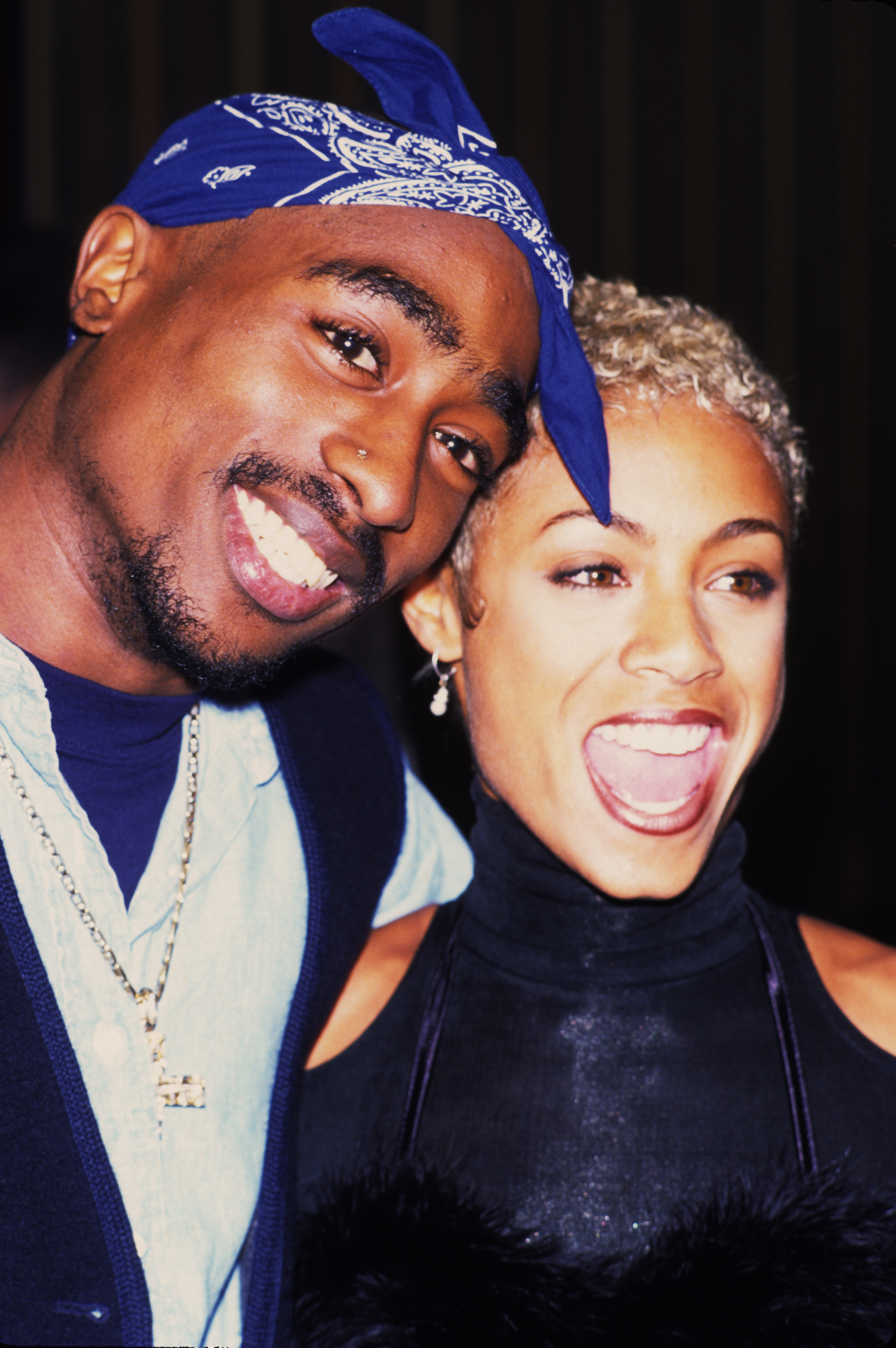 Close-up of Jada and Tupac smiling