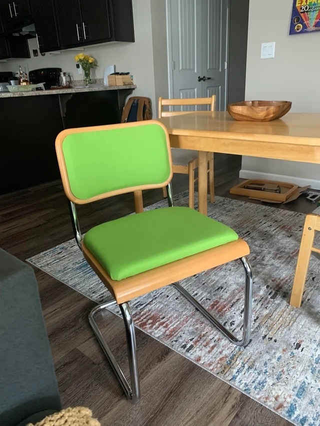 A single chair after with new lime green upholstery
