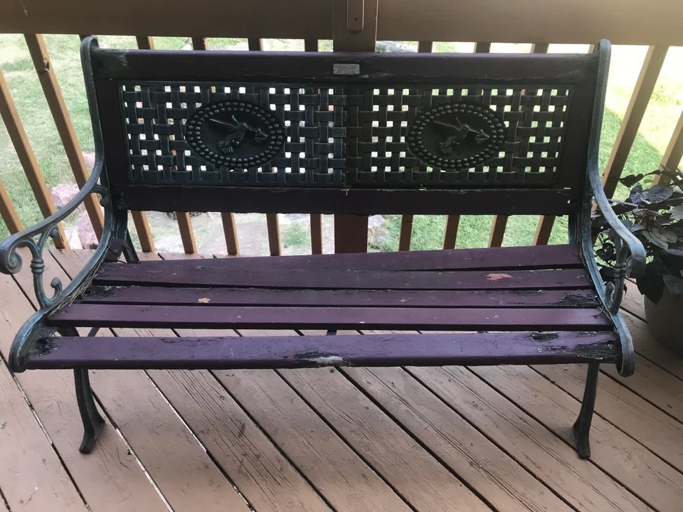 A before image of a bench with broken slats and a red wood stain