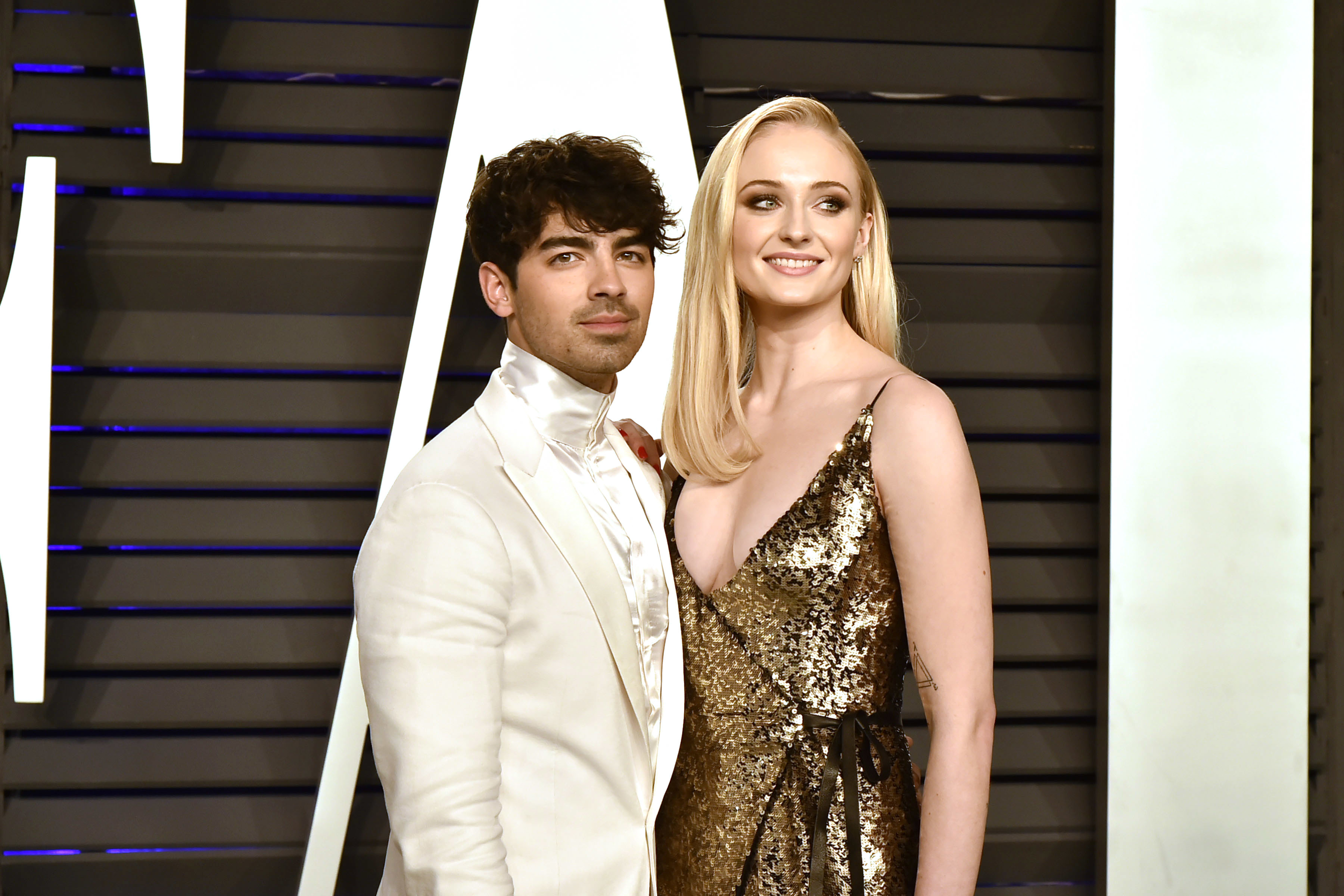 Close-up of Joe and Sophie at a media event