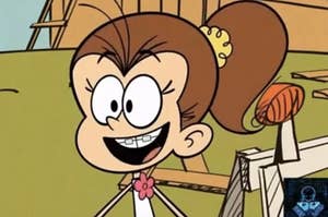 Animated girl from Loud House. She has a high ponytail held together with a scrunchie, wide eyes, and braces.