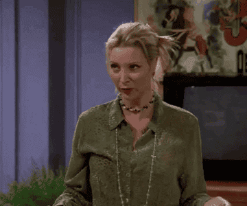 Lisa Kudrow as Phoebe in Friends gesturing in disgust