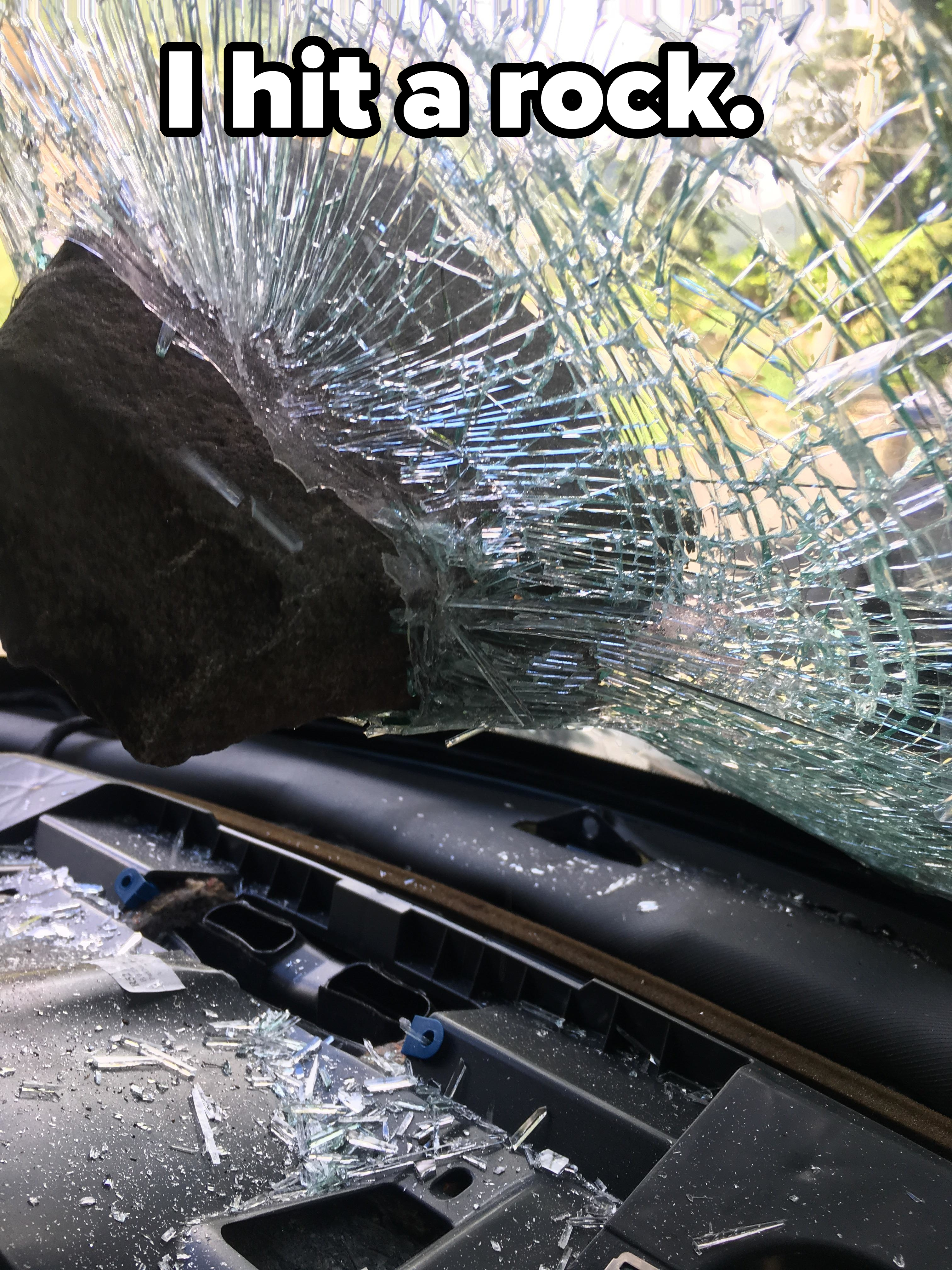 &quot;I hit a rock&quot; caption with a shattered car&#x27;s front window