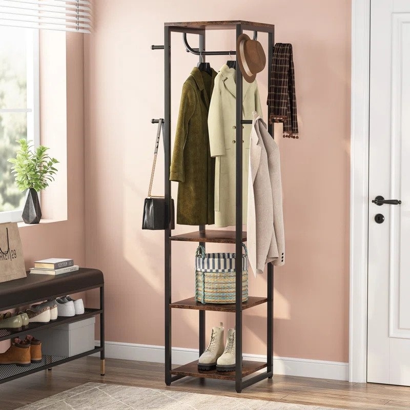 brown freestanding coat rack with shelves and storage for coats, purses, and bags