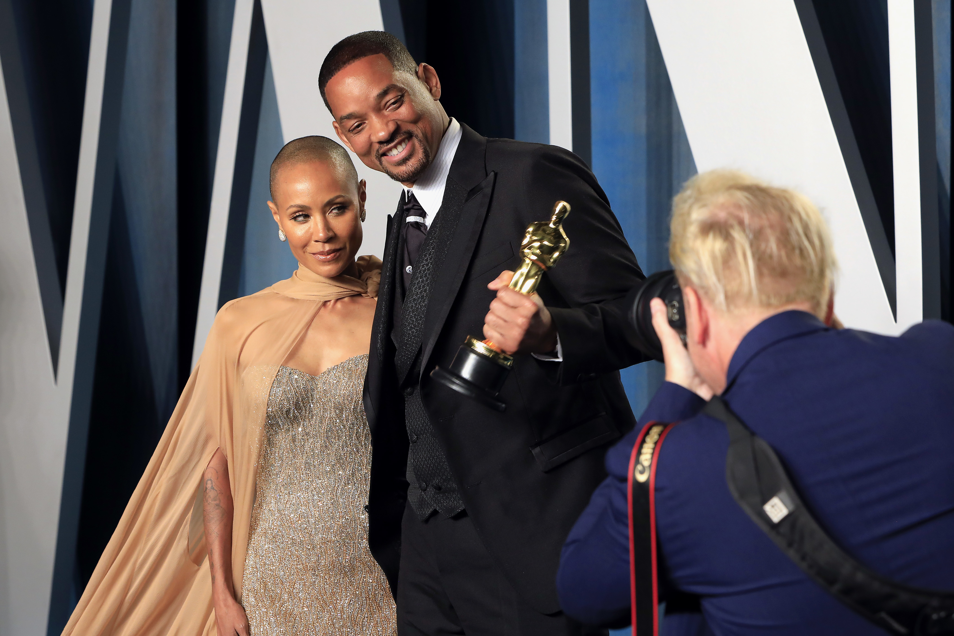 Will holding his Oscar with Jada beside him