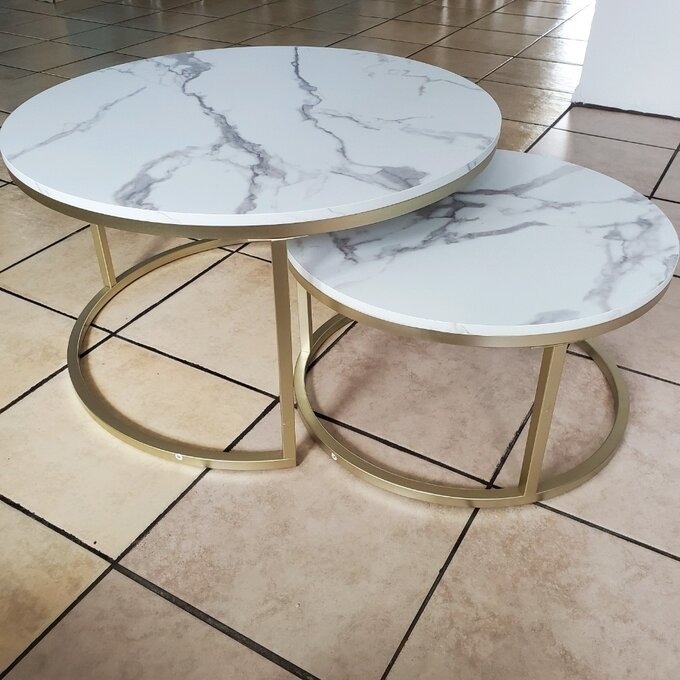 the circular nesting tables with marble-esque tops