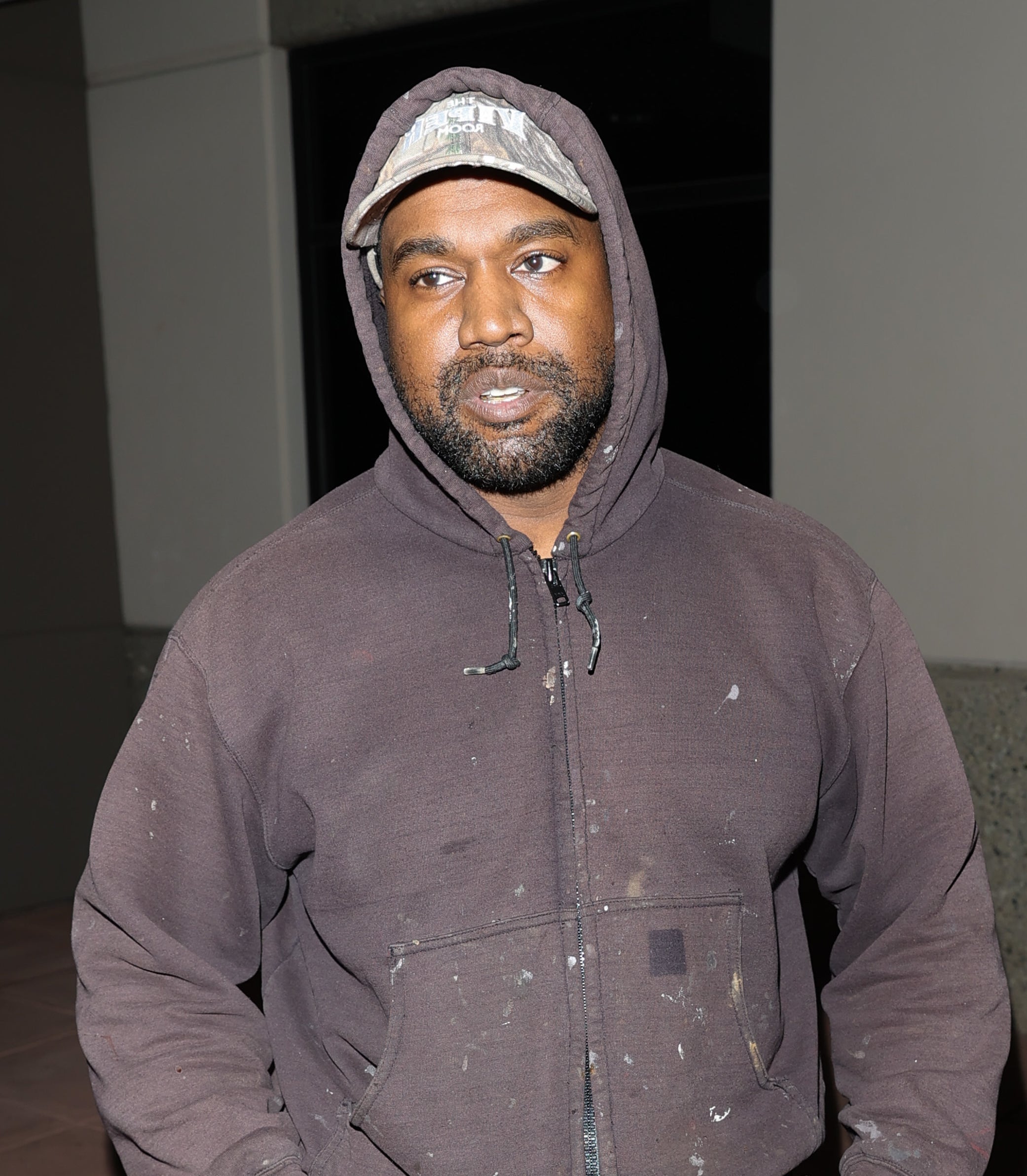 Close-up of Ye in a hoodie