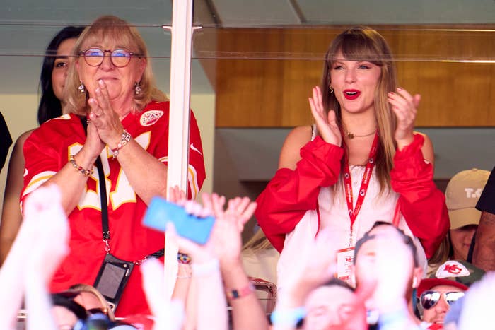 Taylor and Travis&#x27;s mom applauding in the box