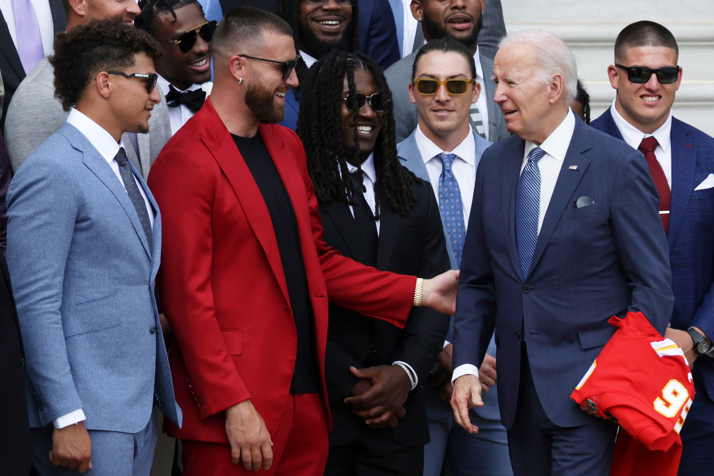 Biden with Travis and the rest of the team