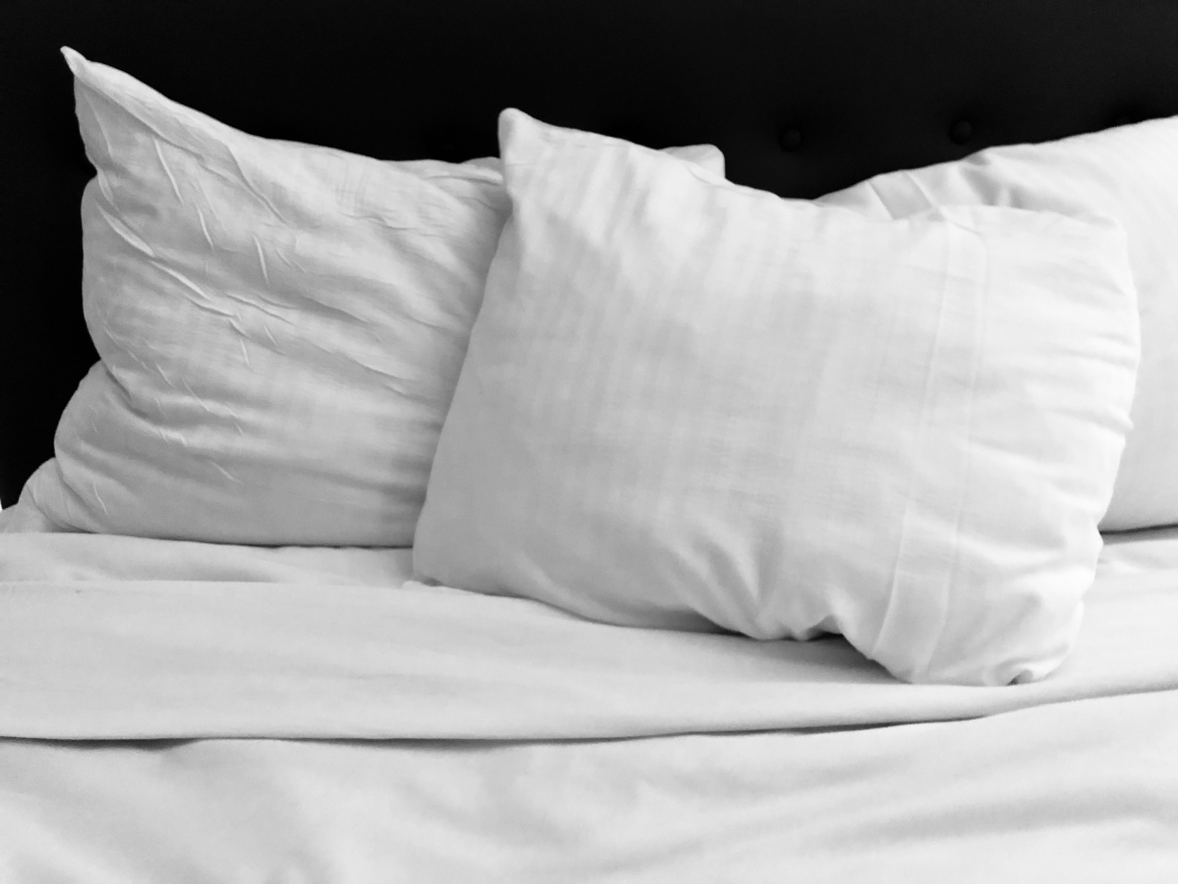 Pillows on top of a bed