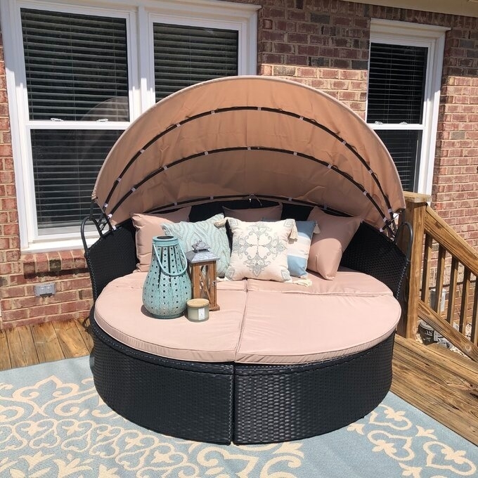 The wicker outdoor daybed on a reviewer&#x27;s deck