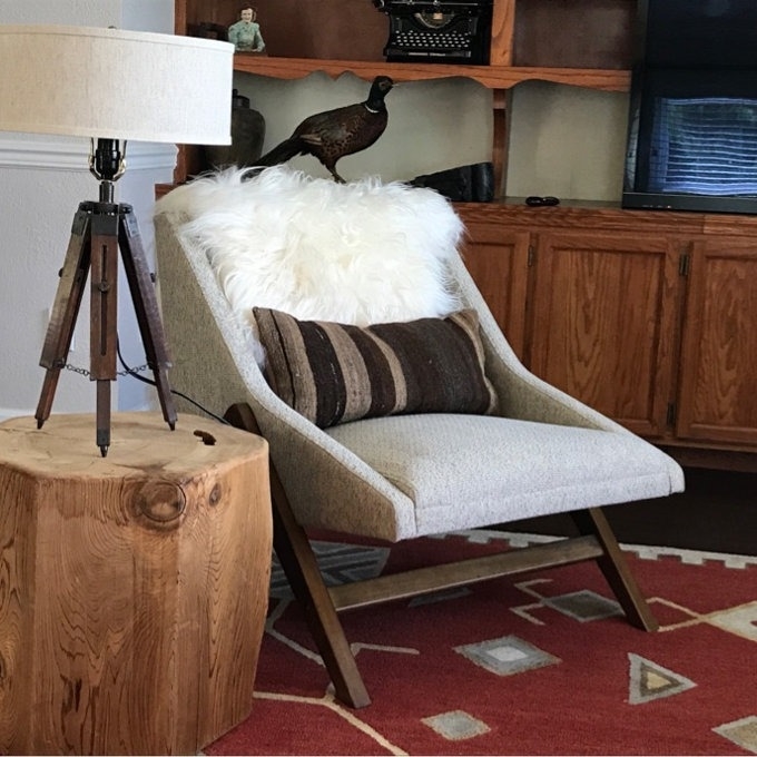 The taupe lounge chair with wooden legs in a reviewer&#x27;s home