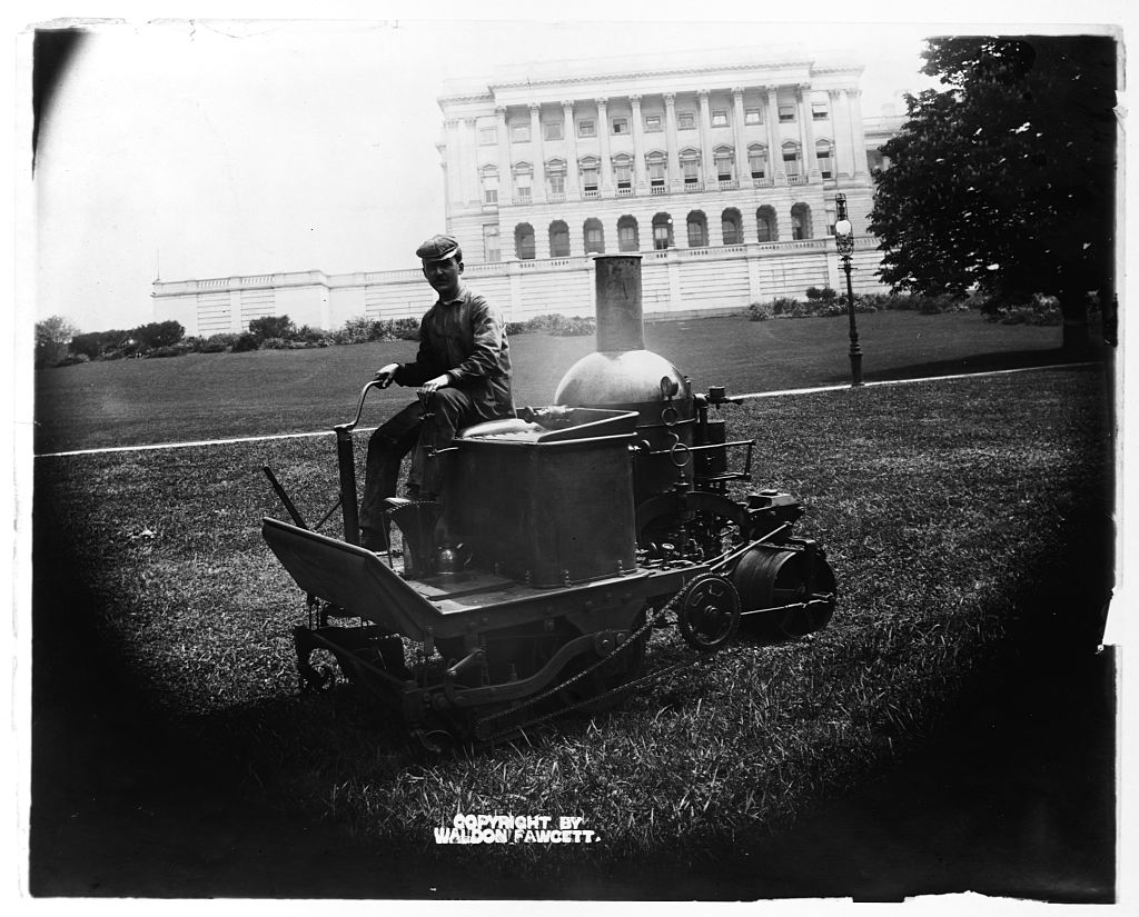 A man mowing the Capitol lawn