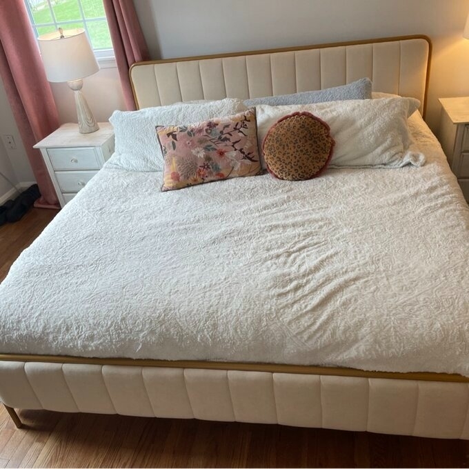 reviewer image of the gold and white bed