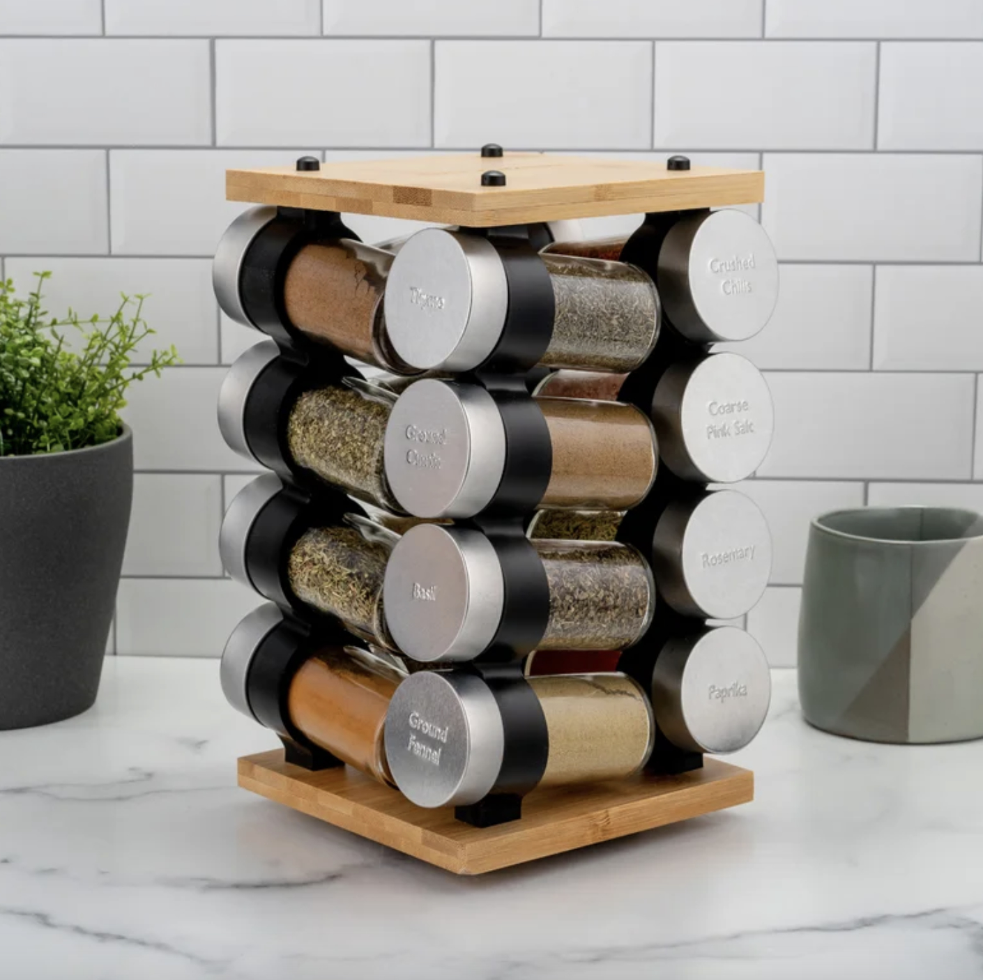 A wooden spice rack on a counter.