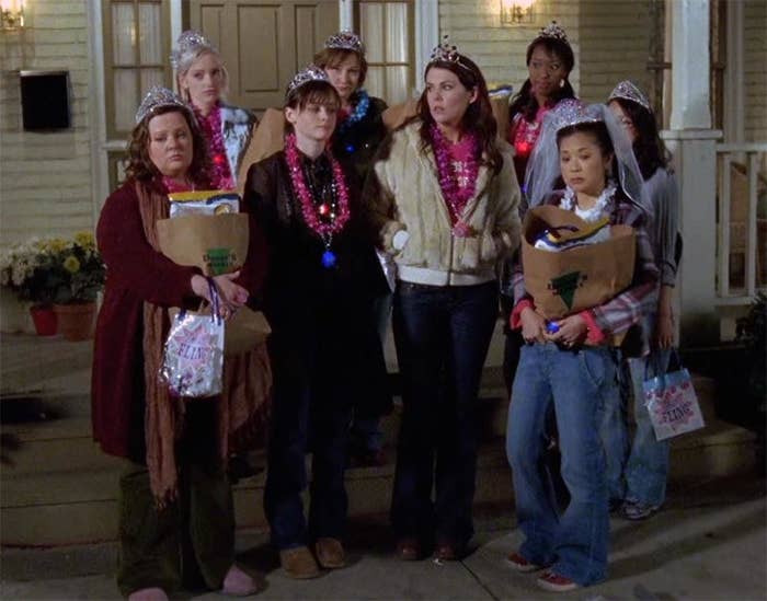 Rory, Lorelai, Sookie, Lane stand outside house during bachelorette party