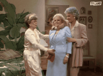 The women of &quot;Golden Girls&quot; embracing in a group hug