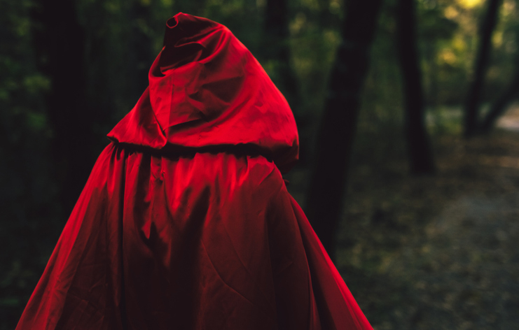A person in a red cloak