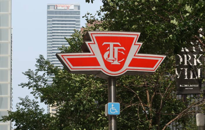 TORONTO, ONT - JULY 26: A Toronto Transit Commission logo stands outside the Bloor-Yonge subway station on July 26, 2023, in Toronto, Canada. (Photo by Gary Hershorn/Getty Images)