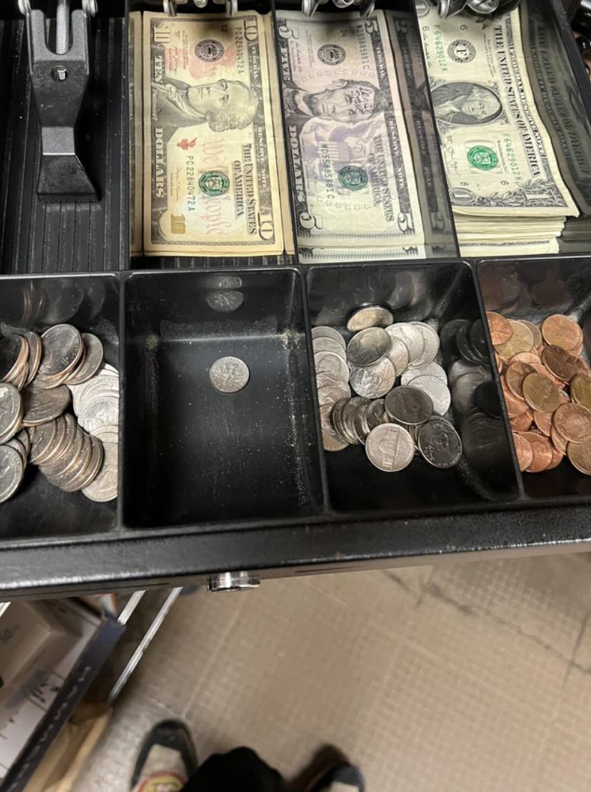 One dime in a cash register