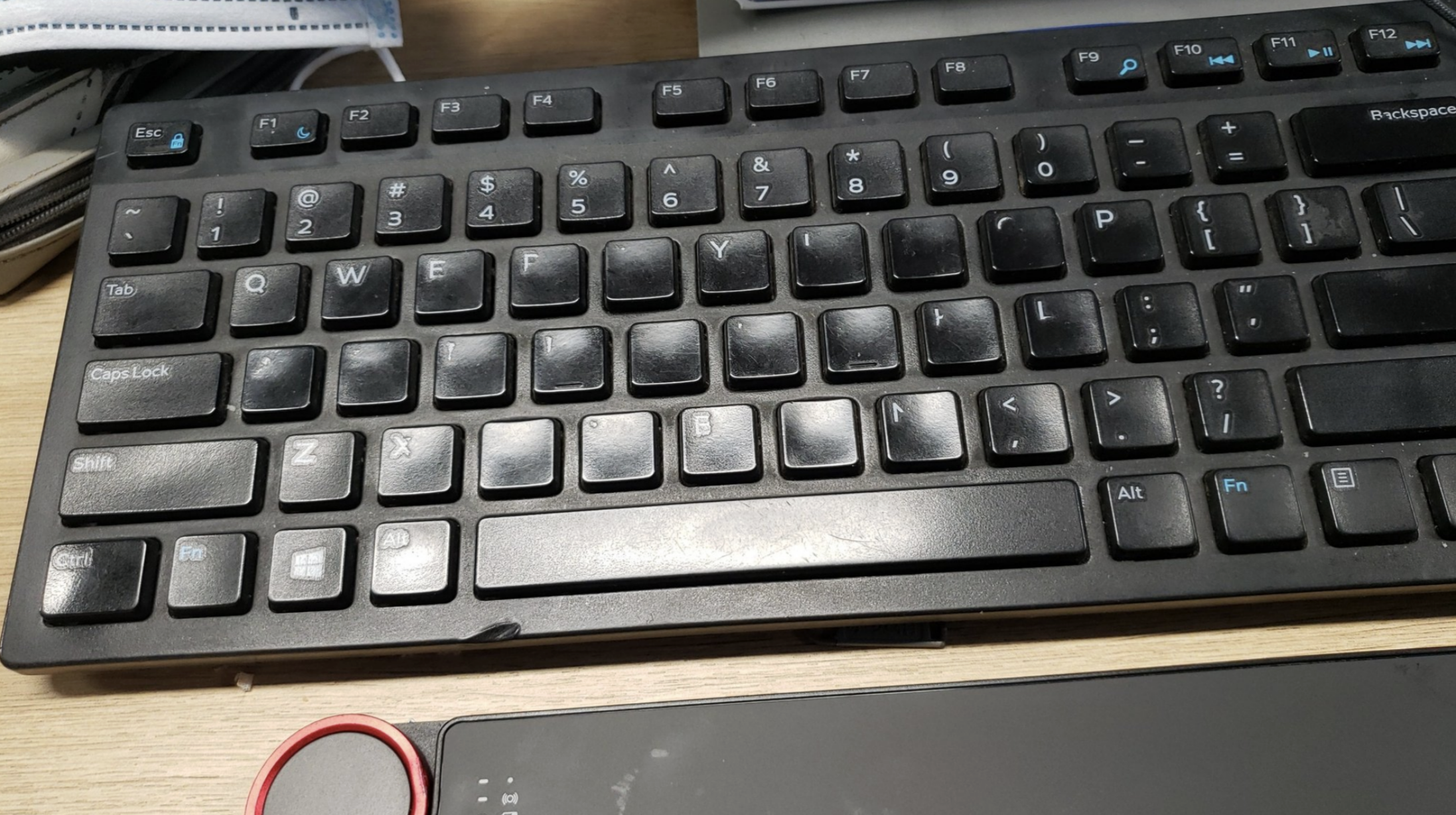 A used and faded keyboard