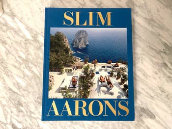 a slim aarons coffee table book