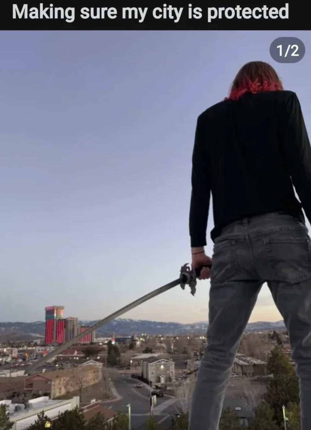 person standing with a sword with text, making sure my city is protected