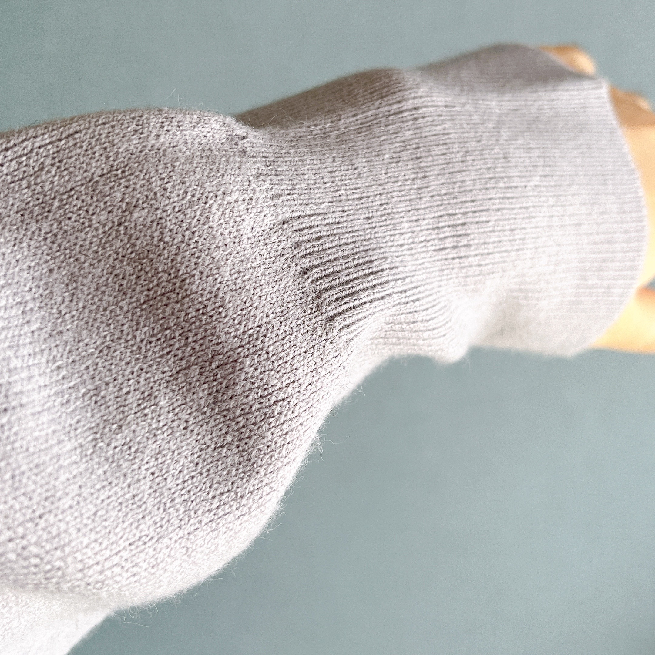 無印良品のオススメのトップス「洗えるミラノリブ編みハーフジップセーター」
