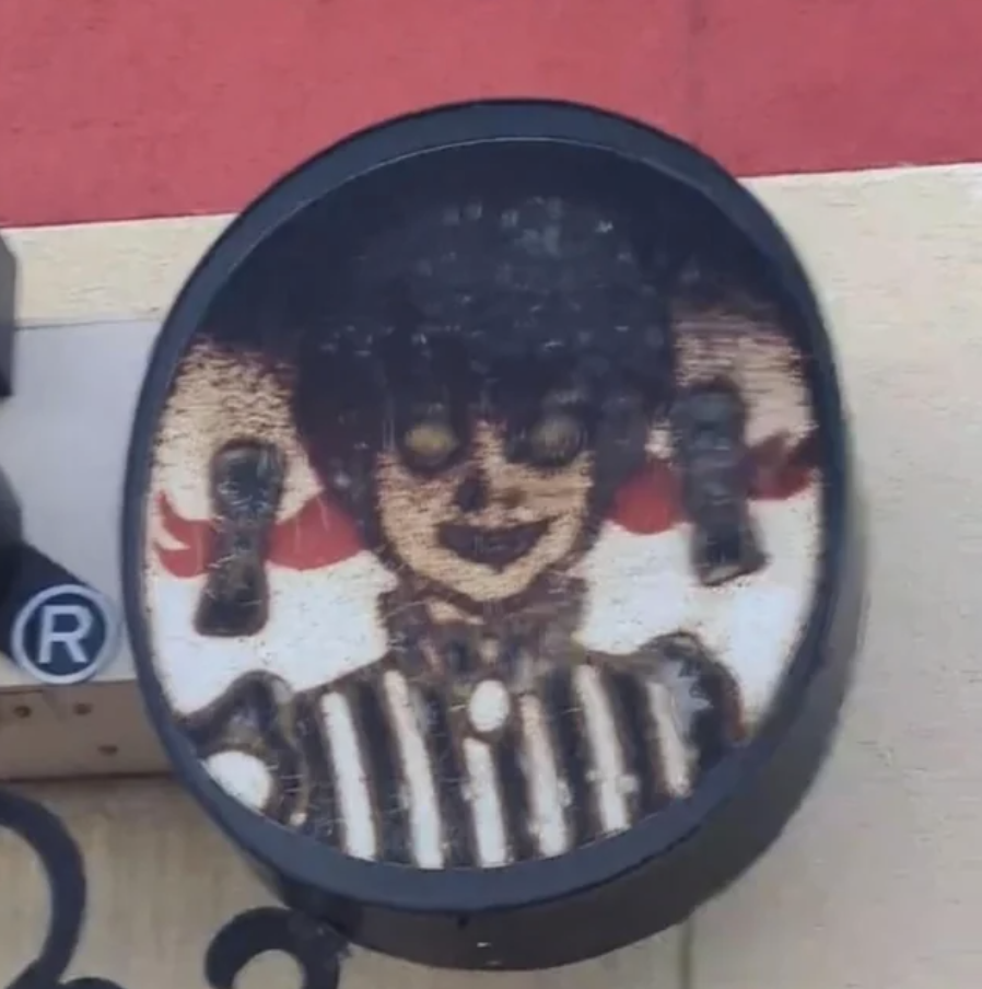 The Wendy&#x27;s logo looking burnt and vaguely demonic