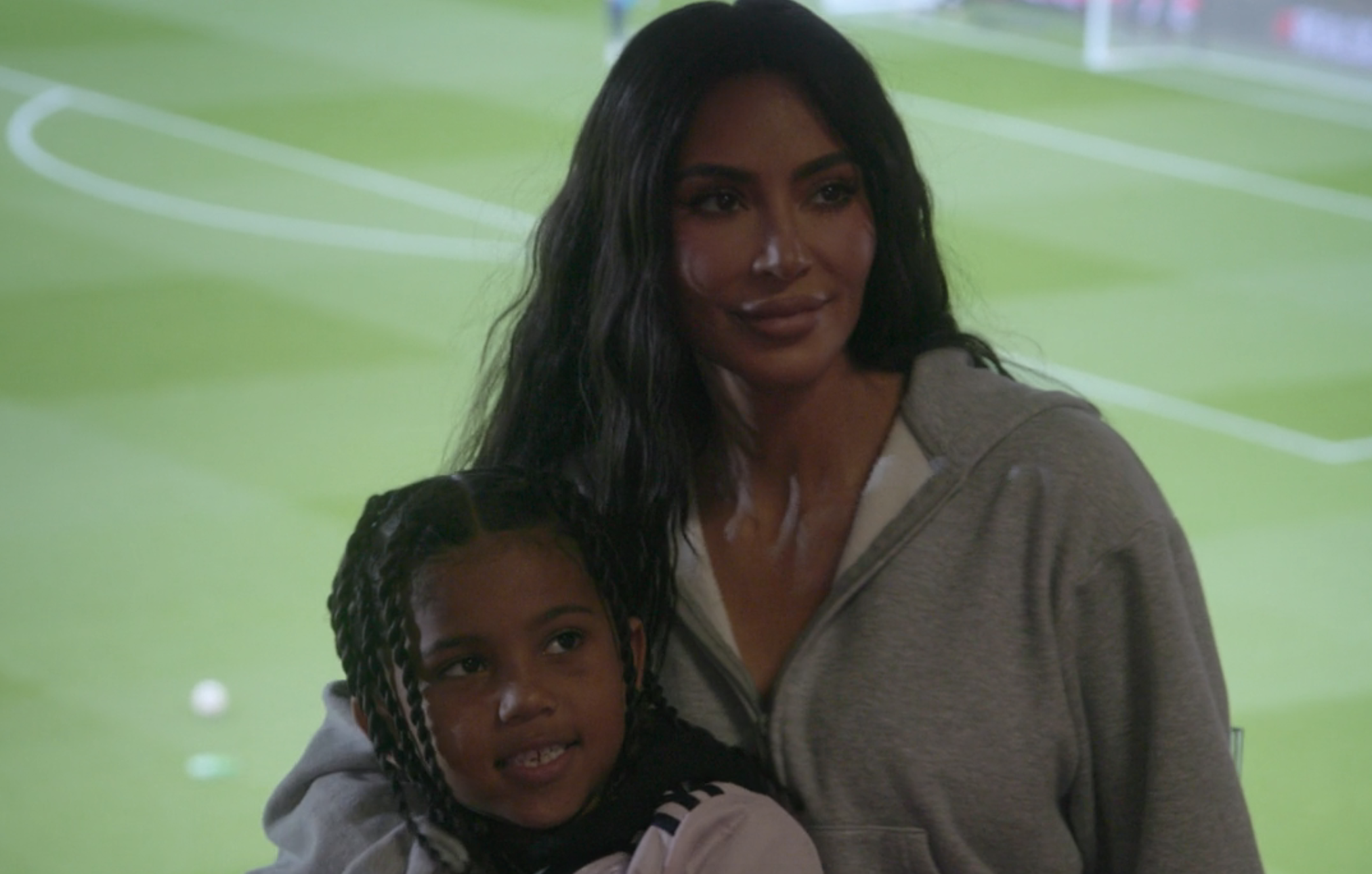 Close-up of Kim with North West