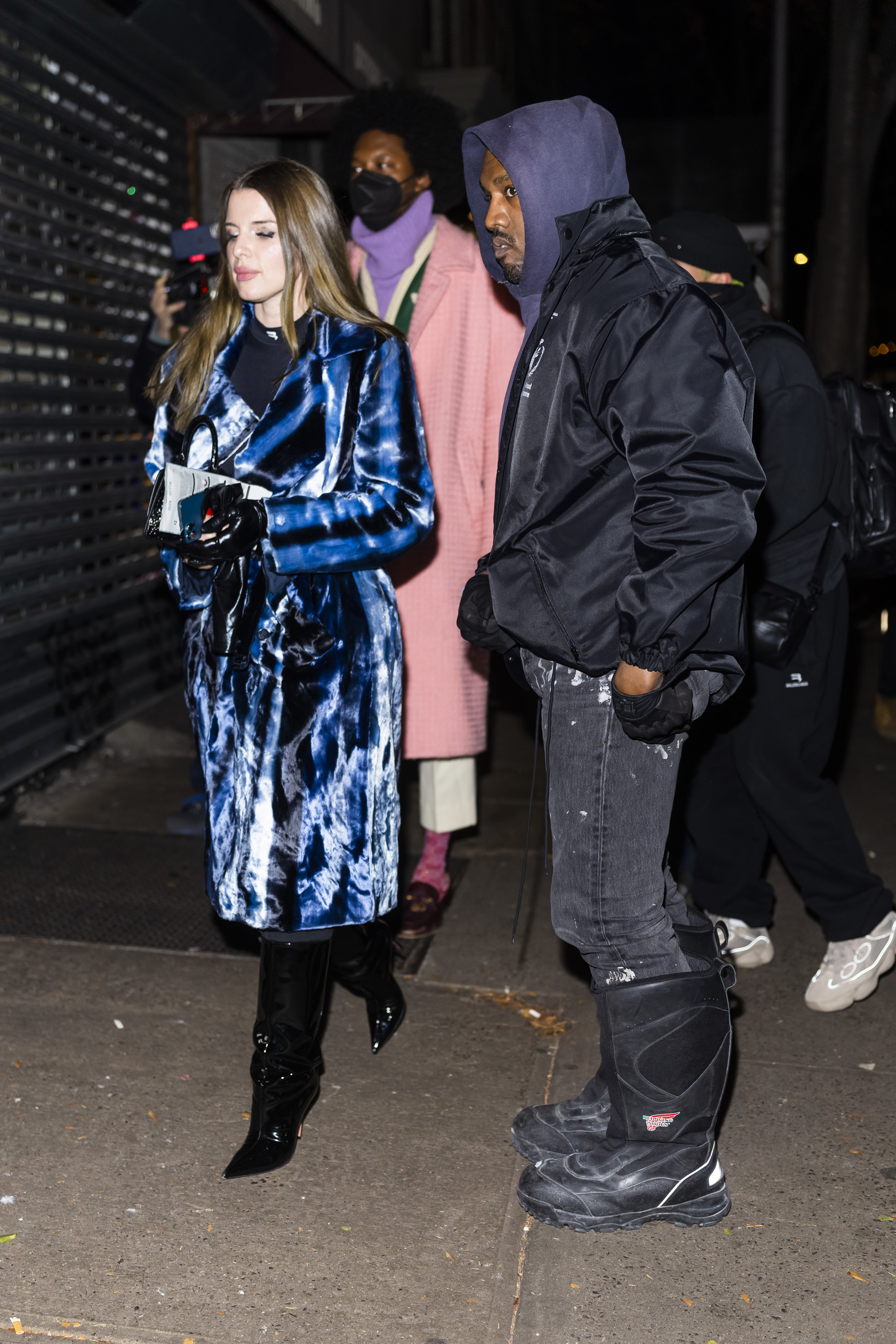 Close-up of Ye and Julia walking together