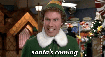 a gif of will ferrel as buddy the elf saying &quot;santa&#x27;s coming&quot;