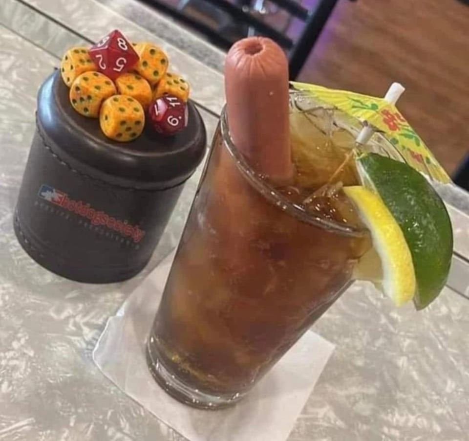 a hotdog in a beverage