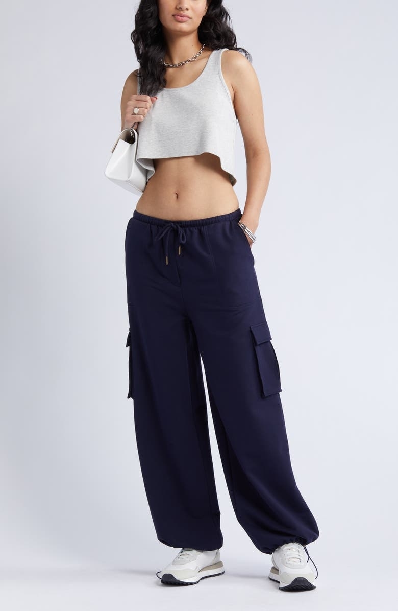 model wearing the navy cargo pants