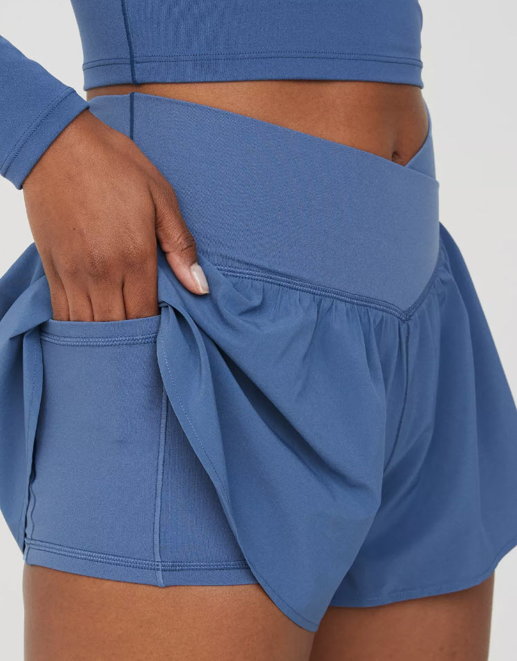 athleisure shorts with model putting hand in pocket