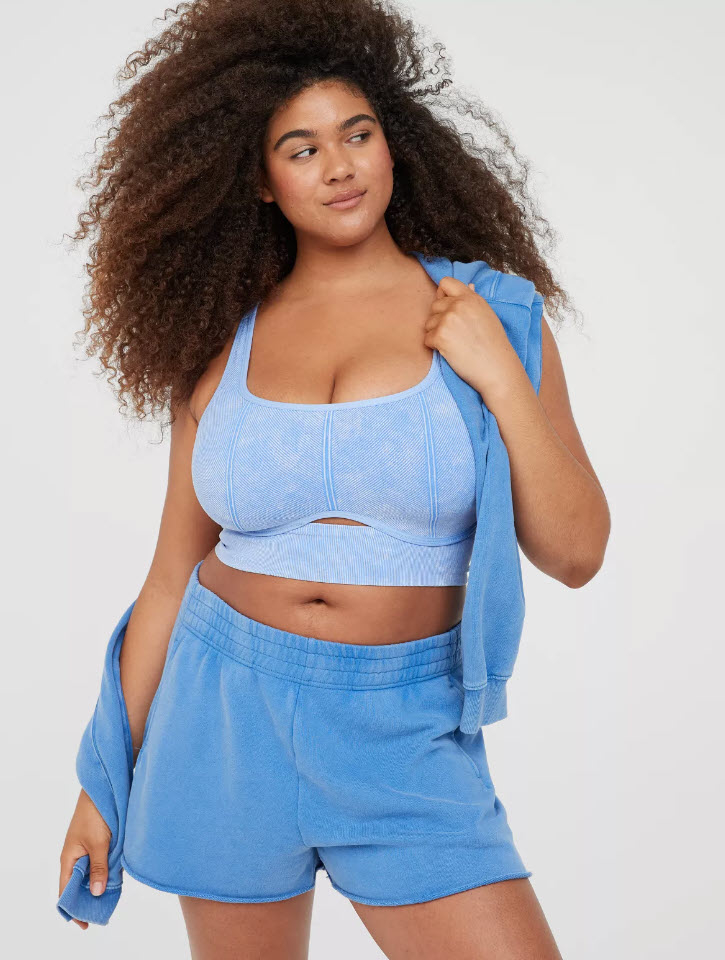 model wearing light blue sports bra