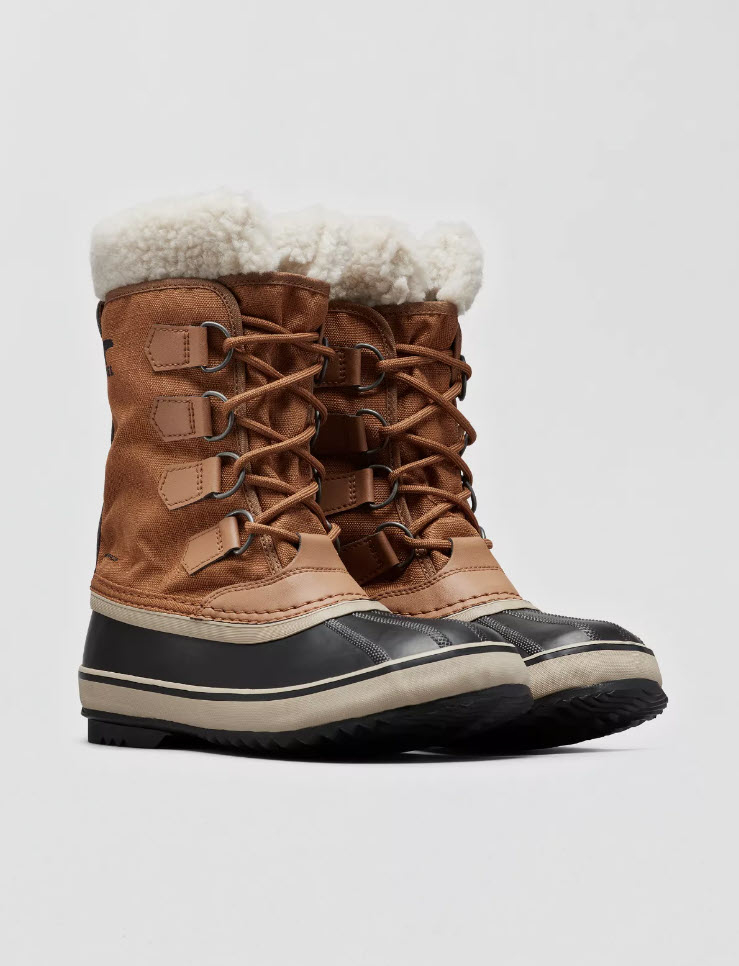 pair of tall brown and black rain/snow boots