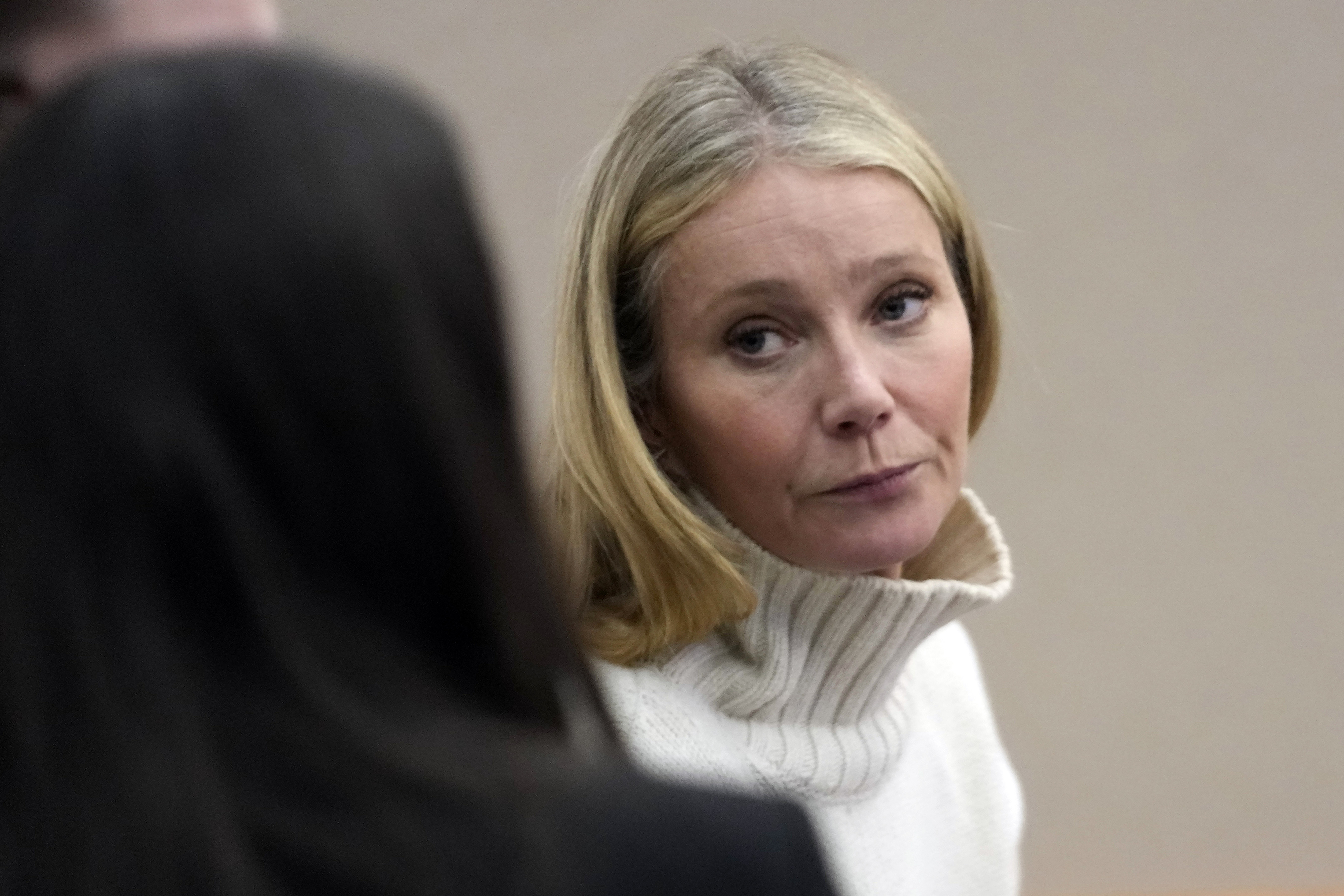 Close-up of Gwyneth in court