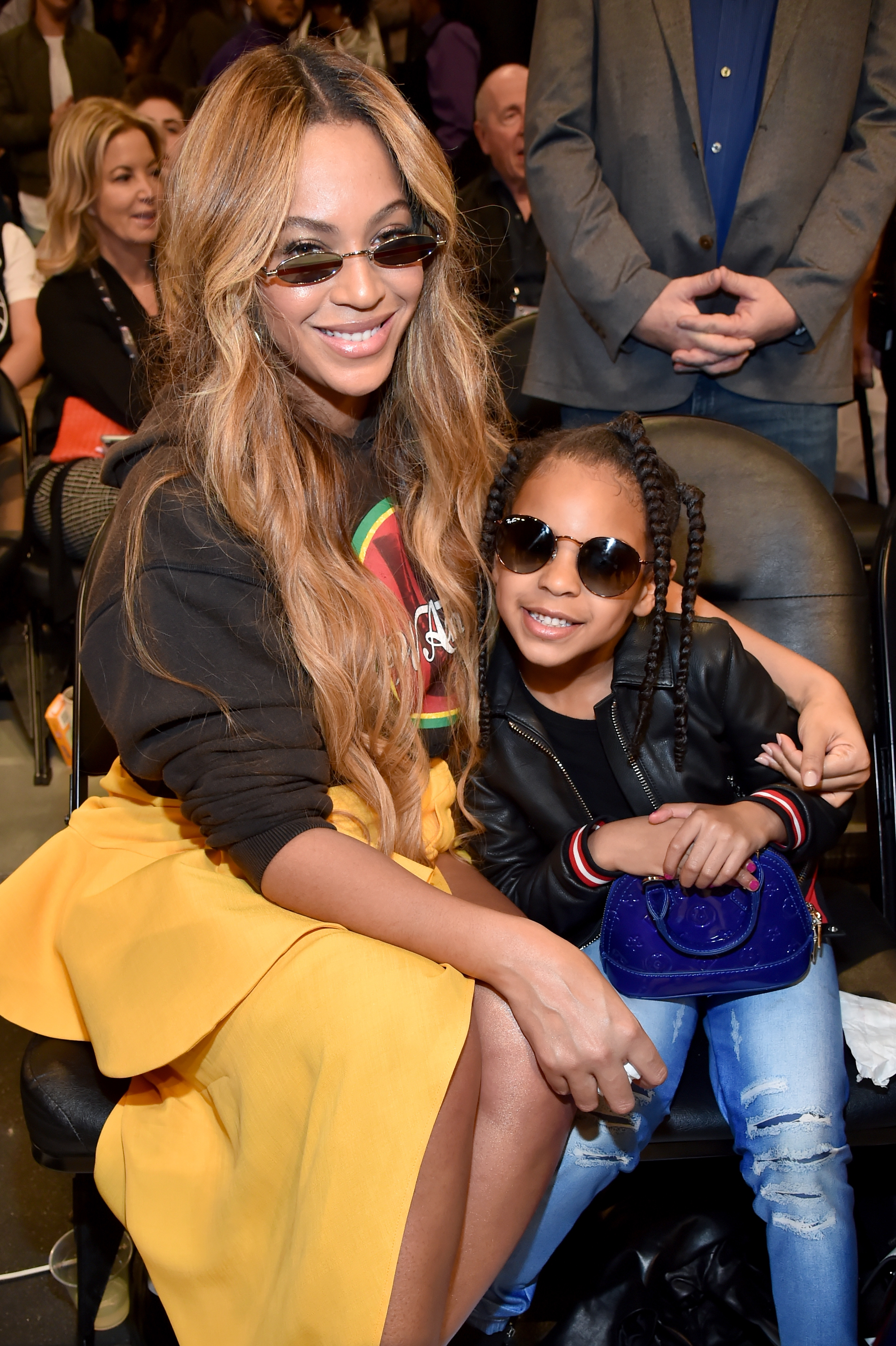 Close-up of Beyoncé sitting with Blue