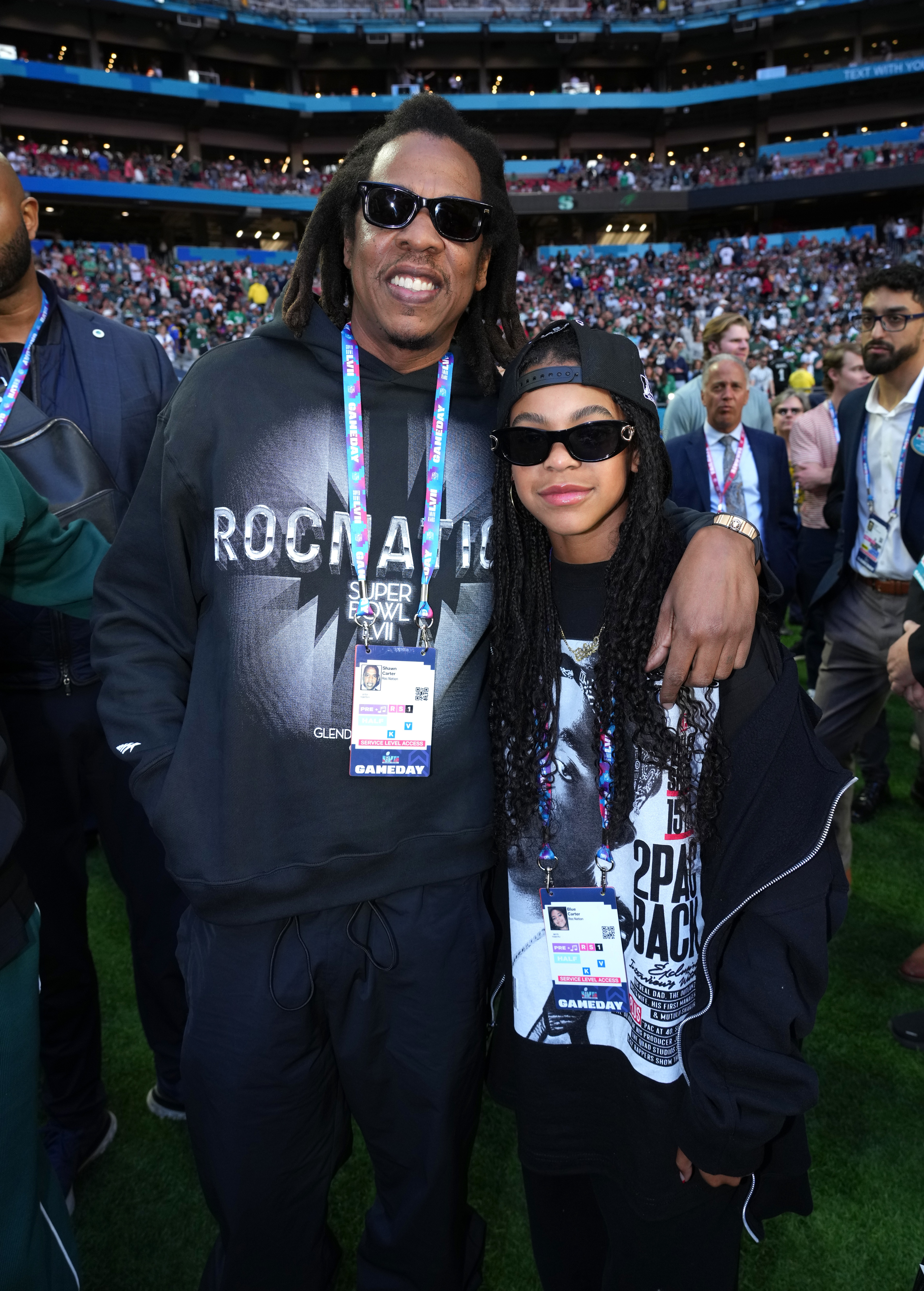 Blue at a sports arena with Jay-Z, who&#x27;s hugging her