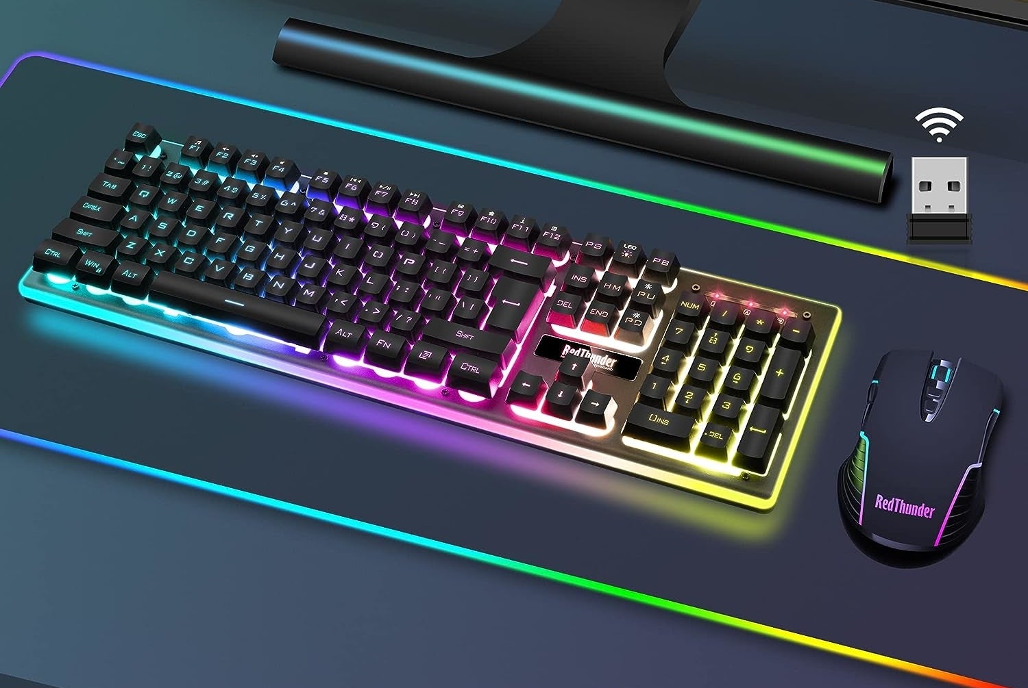a black rainbow backlit keyboard and mouse