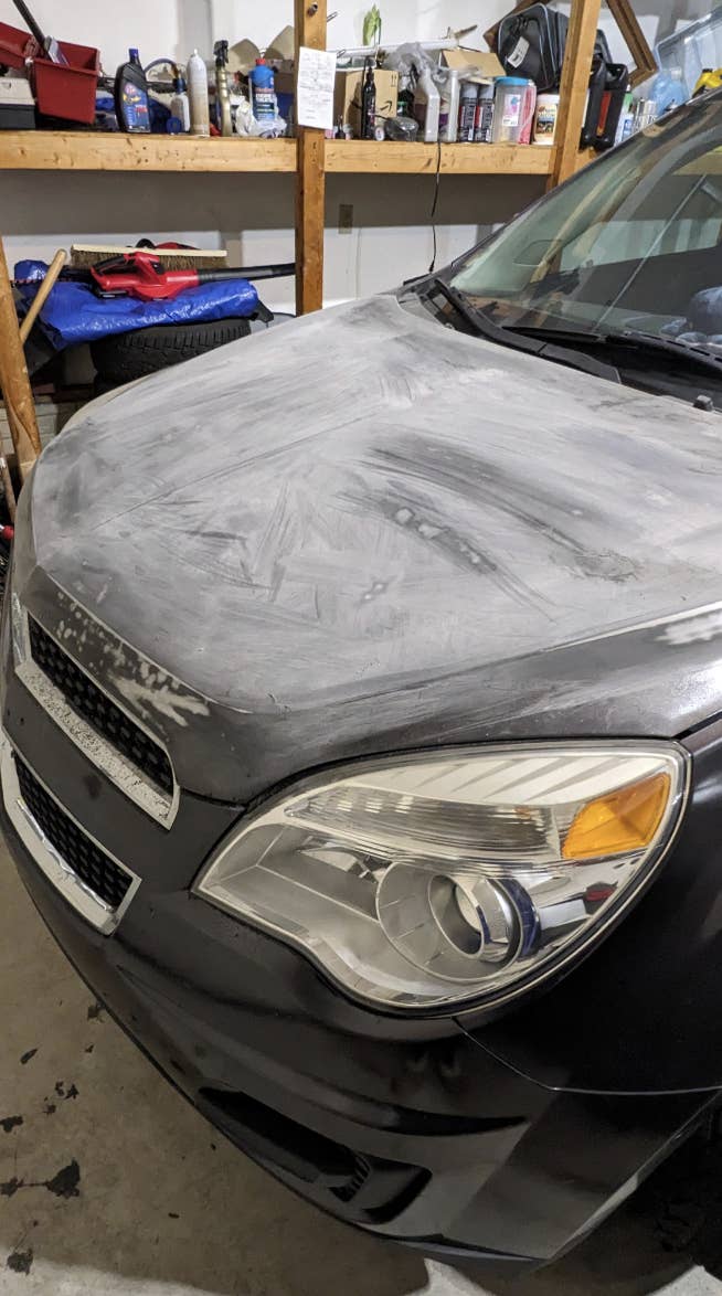 A hood on a car that's been sanded