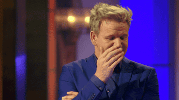 Gordon Ramsay covering his face