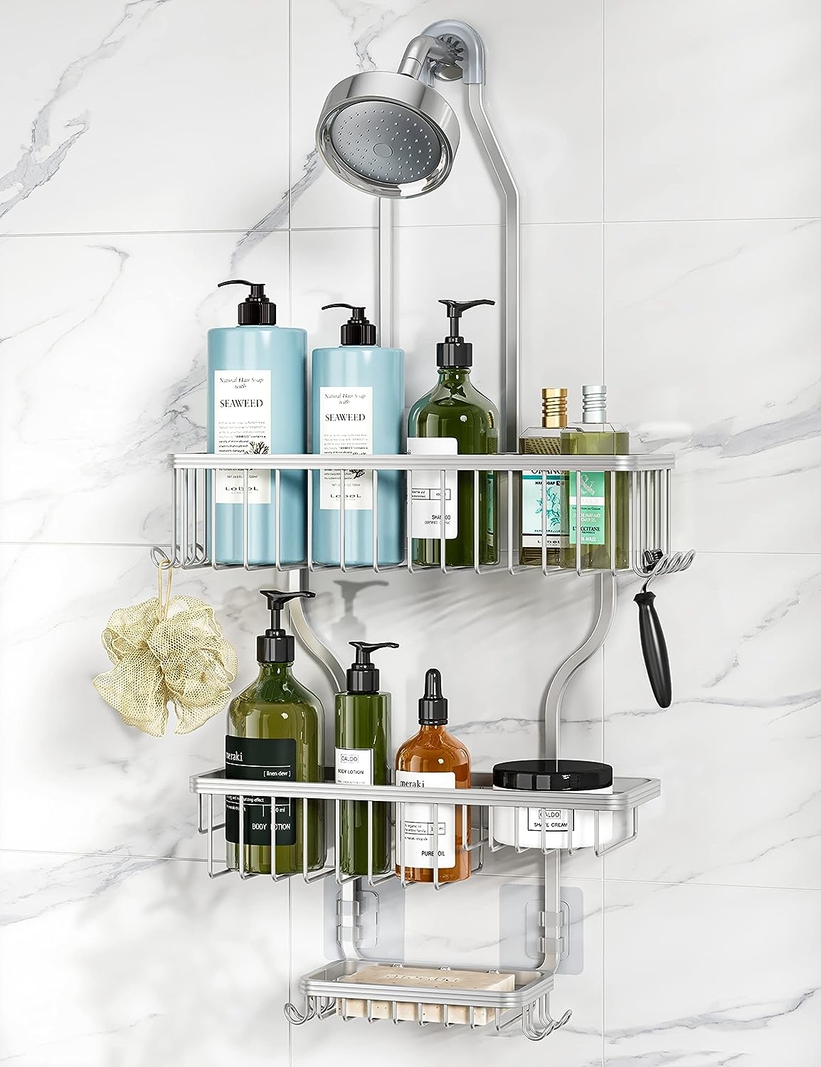Silver shower shelf holding various hygiene products