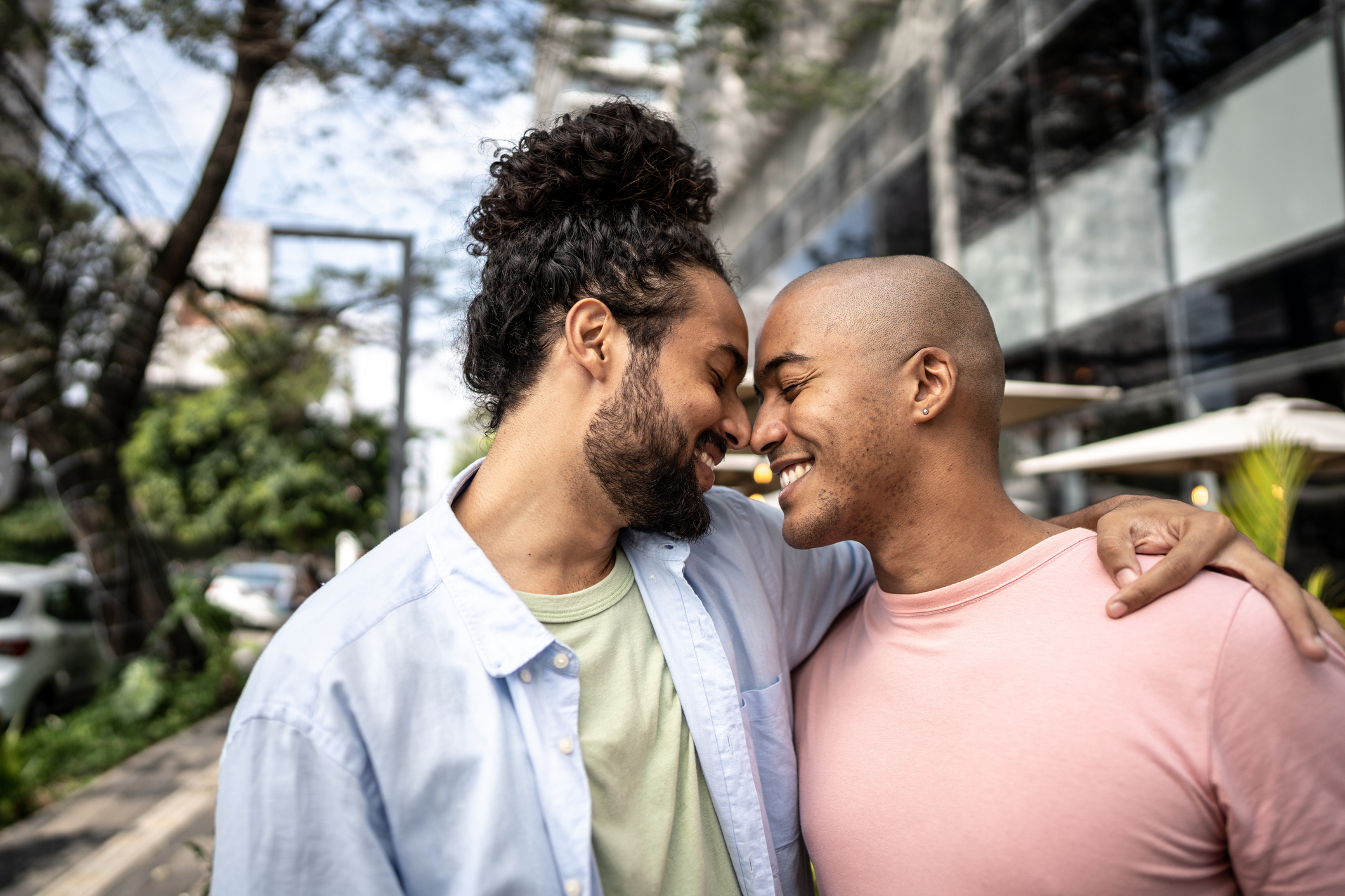 A couple smiling at one another